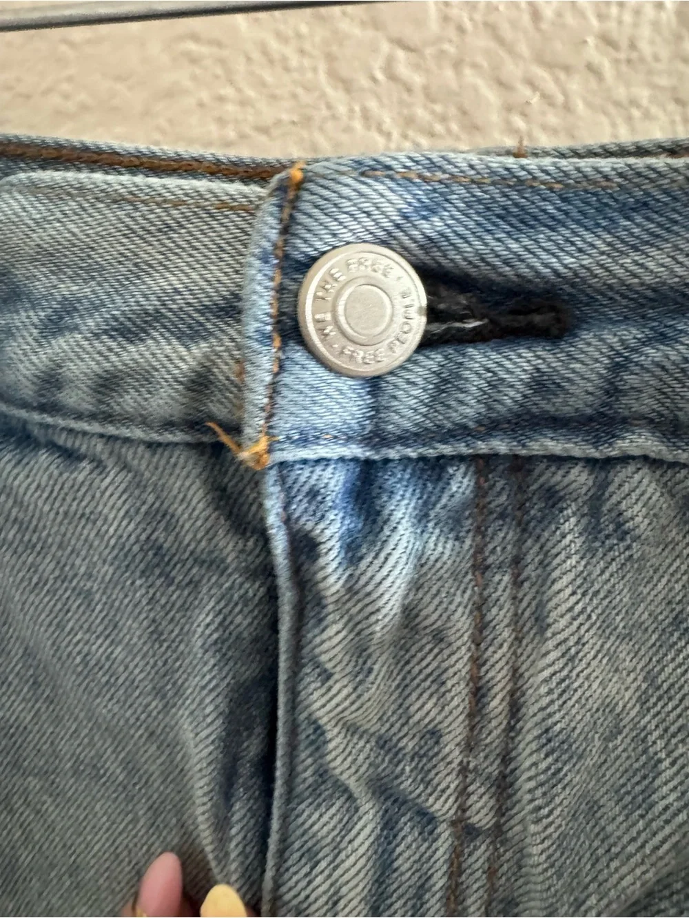 Free People We the Free Distressed Denim mini skirt